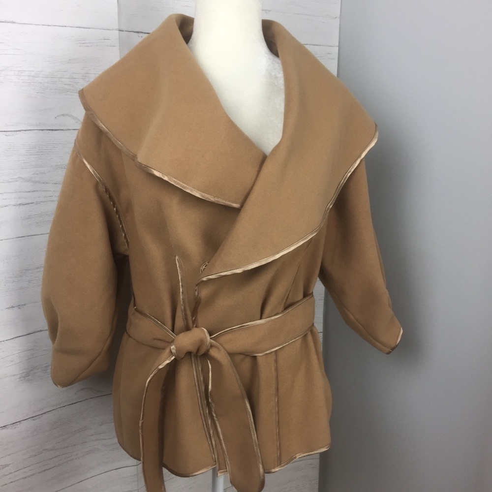 Wrap jacket. Soft fabric runs small
